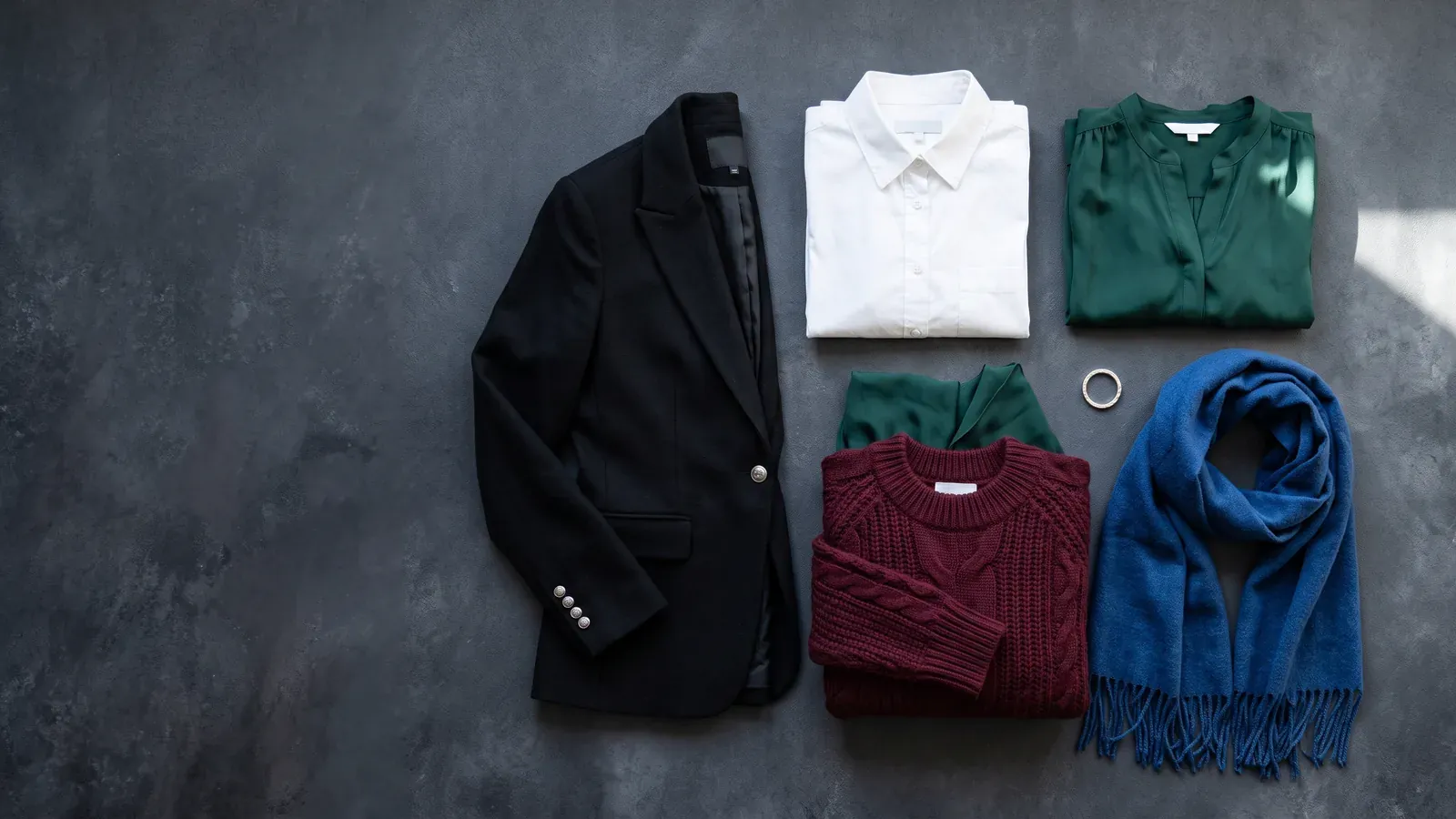 Deep Winter colors: clothes laid flat in the Deep Winter palette